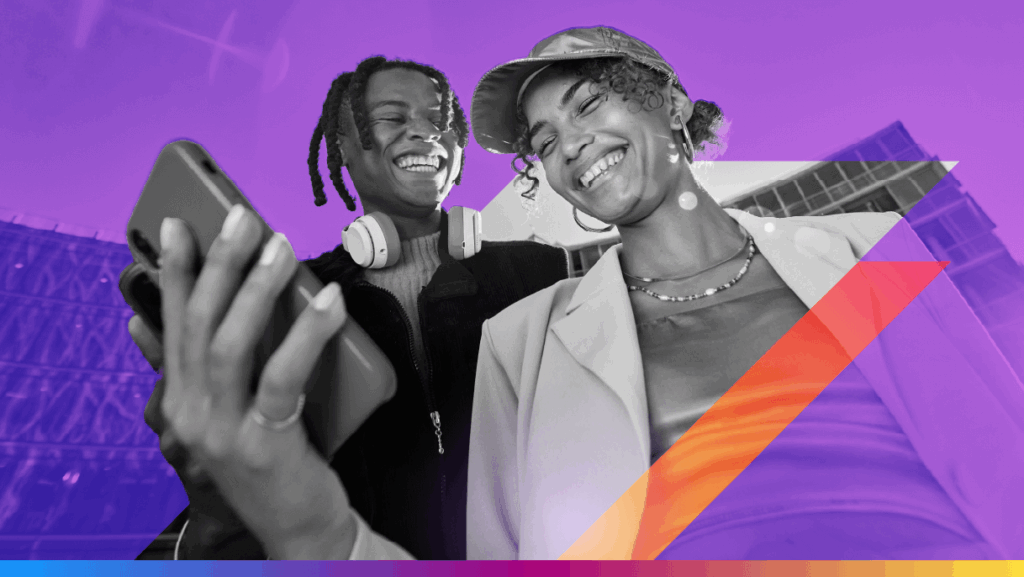 two people laughing - looking at a phone - featured image for IDC CDP 2025 satisfaction rankings article