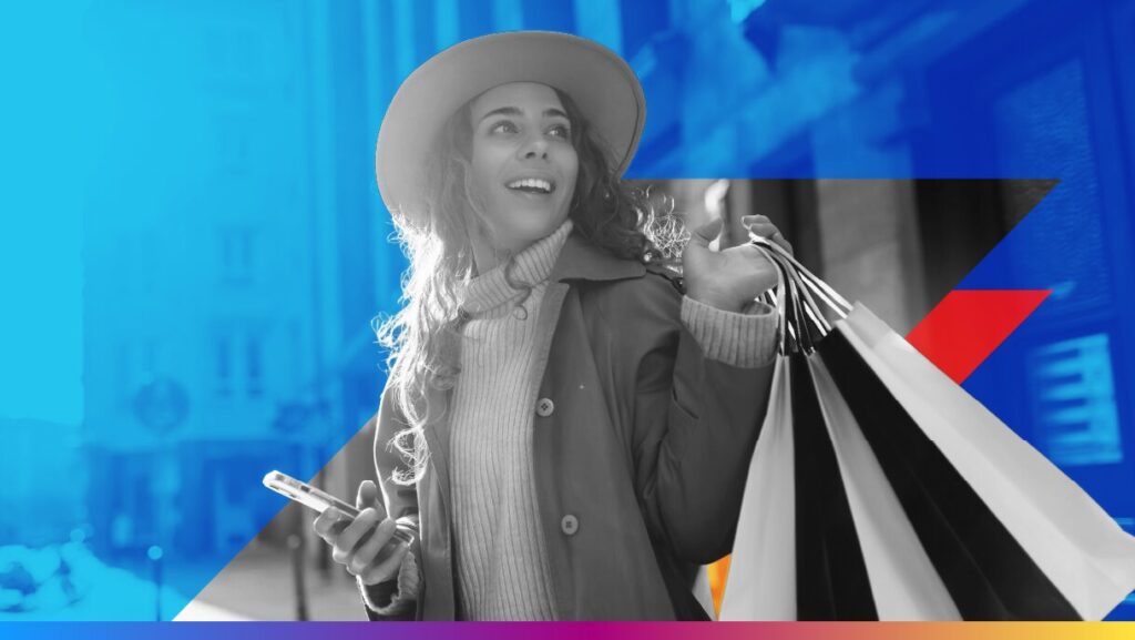 person with shopping bags and a mobile device